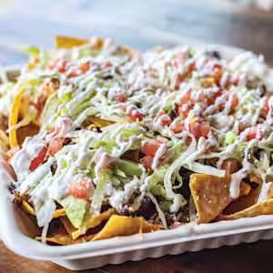 Bomb Taco signature dishes NachosBurrito BowlEnchiladas